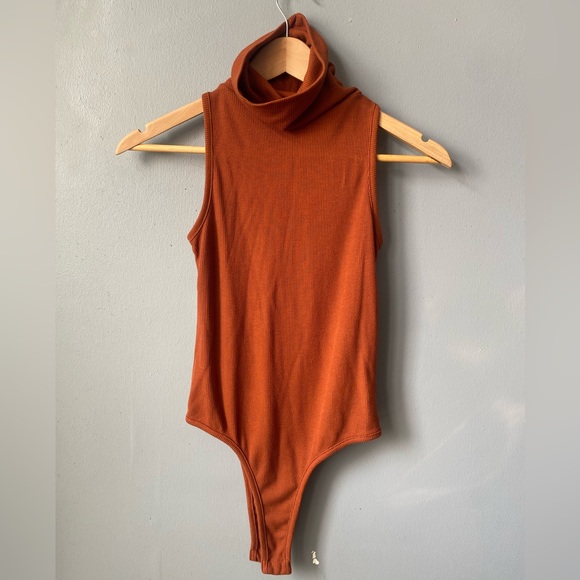 Tops - Sleeveless Turtleneck Bodysuit